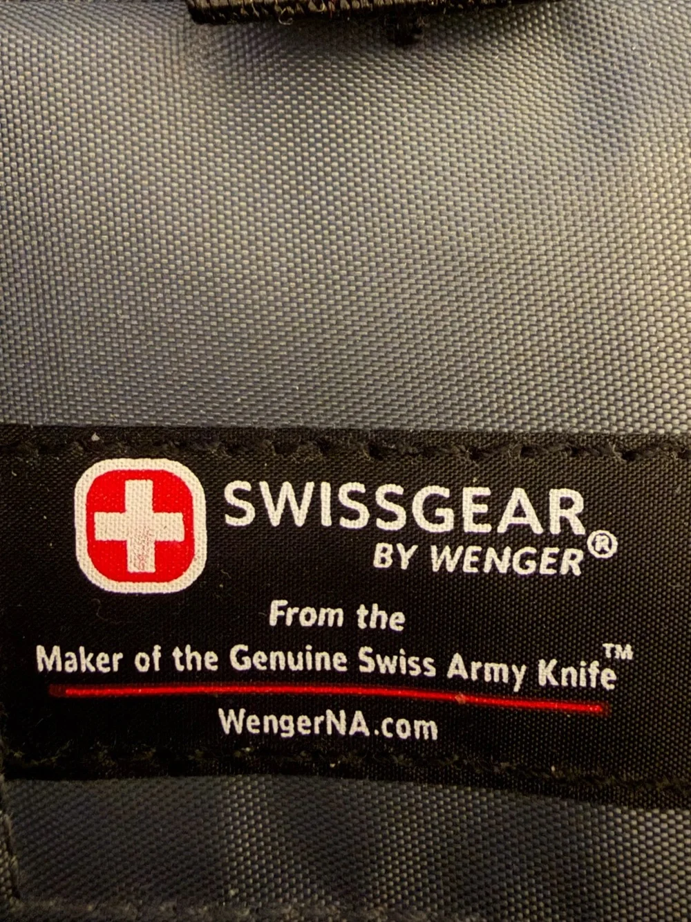 SwissGear Black and Gray Backpack with Red Logo Accent